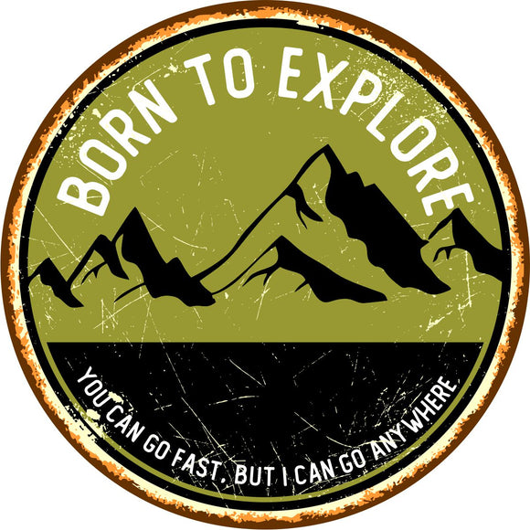 Rustic spare tire cover with mountain silhouette and the saying born to explore, you can go fast, but I can go anywhere