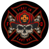 Firefighter insignia with the saying first in last out with a skull and cross bones wearing a fireman's hat helmet