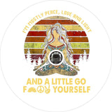 White vinyl colorful goddess spare tire cover design of a women sitting criss-crossed and a funny quote around the edge and below with a space for a back up camera