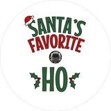 White vinyl funny spare tire cover design in green and red letters saying Santa's Favorite Ho, with a Santa hat and holly berries Christmas theme design. Spare tire cover design for back up cameras on Jeep, Bronco, Campers, and more