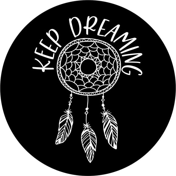 A dream catcher design with dangling feathers and the saying 