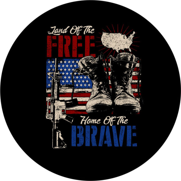 Patriotic spare tire cover design with images of a military rifle, boots, and a silhouette of the United States on top of an American flag and the quote, 