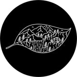 Creative spare tire cover design of a leaf outline and filled with hand drawn mountains and an exploring SUV. 