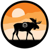 Spare tire cover design of a simple black silhouette of a moose walking with the background sunset in an orange Ombre design that can be custom made to fit the spare tire cover for a Jeep, Bronco, RV, travel trailer, camper, and more that has a back up camera